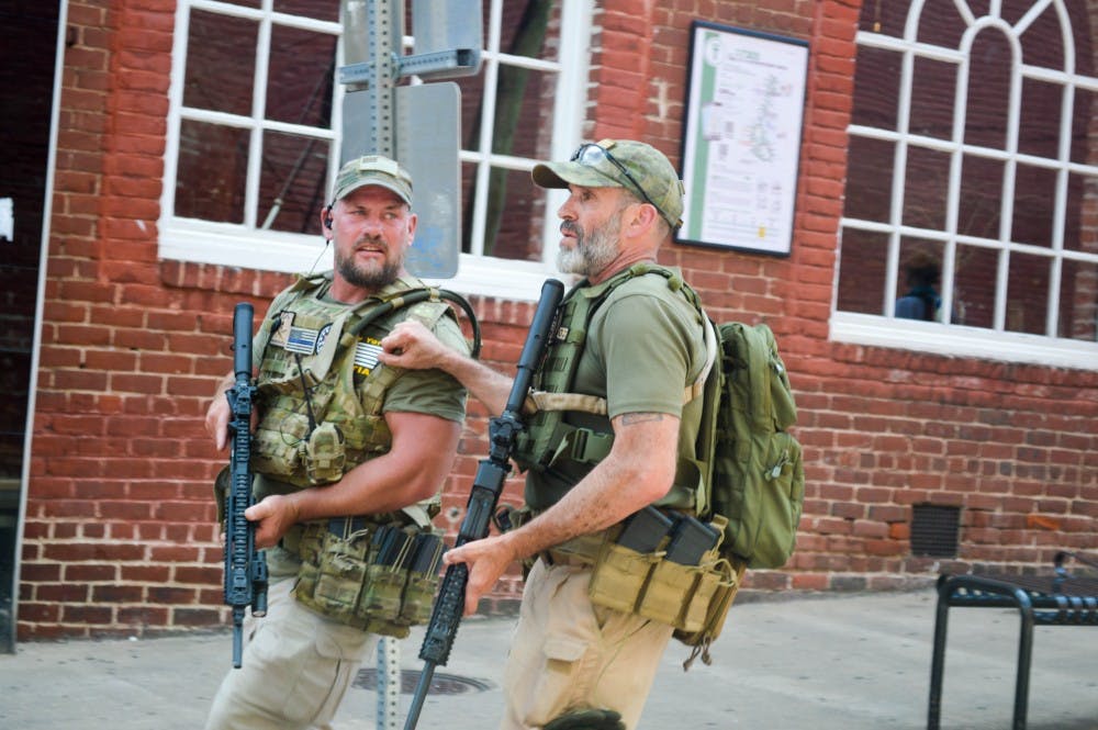 Several militia groups bared firearms in downtown Charlottesville during the Unite the Right rally of Aug. 12.