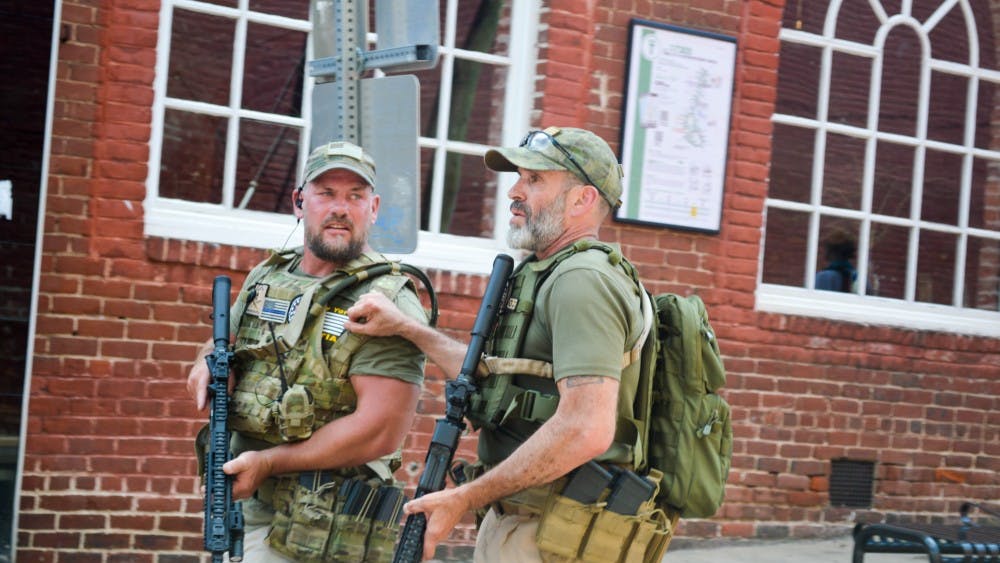 Several militia groups bared firearms in downtown Charlottesville during the Unite the Right rally of Aug. 12.