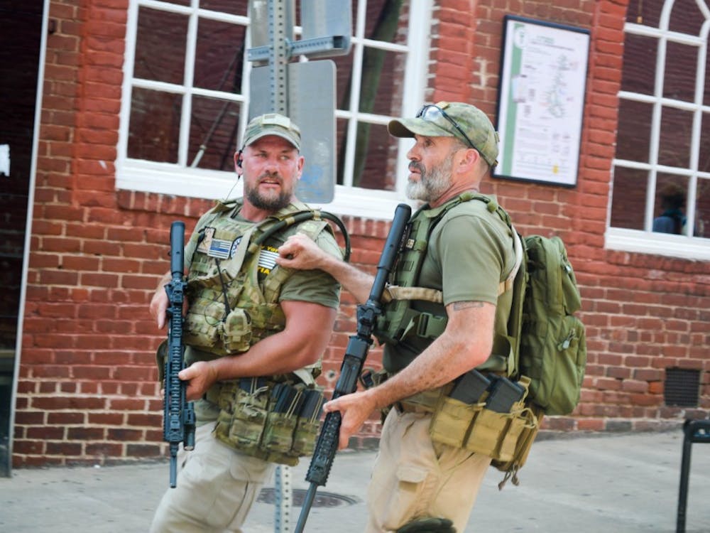 Several militia groups bared firearms in downtown Charlottesville during the Unite the Right rally of Aug. 12.