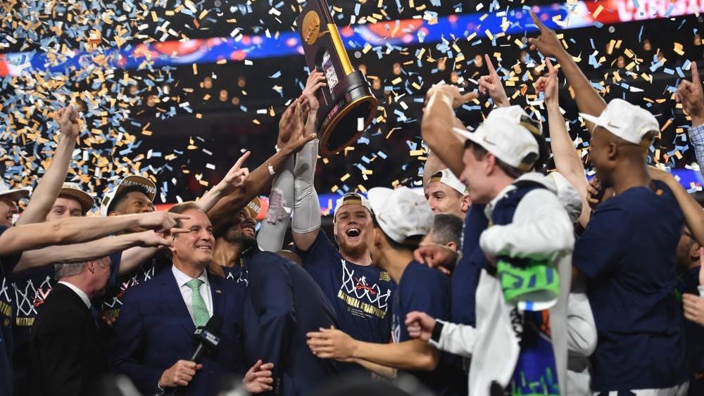 The Cavaliers celebrate their victory at the 2019 NCAA Basketball Championship.