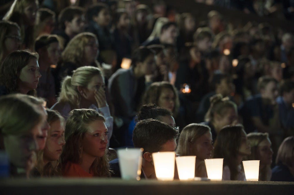 Students gathered in McIntire Amphitheater for a candlelight vigil for missing Hannah Graham