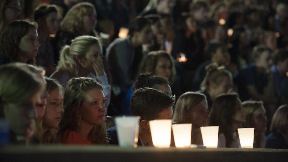 Students gathered in McIntire Amphitheater for a candlelight vigil for missing Hannah Graham