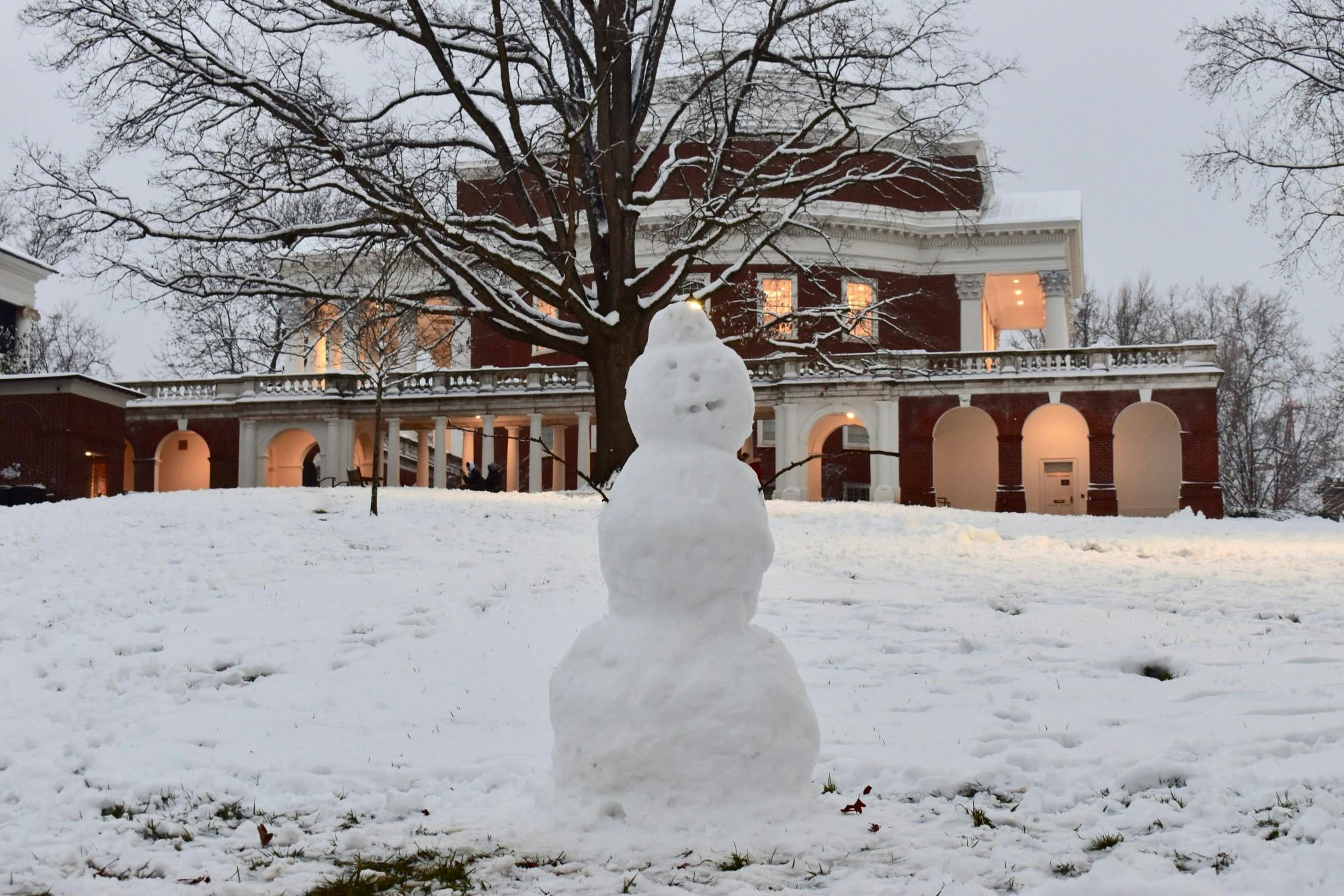 Photos by Emma Klein, Sophie Roehse, Jacob Berton, Stratton Marsh and Ankit Agrawal.

Many students enjoyed the snowfall that hit Grounds before the first day of classes for the spring semester by taking to the Lawn on Sunday. University President Jim Ryan announced a snow sculpture building contest — prizes for which include tickets to a basketball game this season, President's box tickets to a football game or a s'mores-making gathering with four friends, President Ryan and Dean of Students Allen Groves.

National Weather Services issued a Winter Storm Warning for the City of Charlottesville and surrounding areas, predicting the Sunday snowfall. Groves addressed the impending weather and its potential impact on University services in a University-wide email Saturday afternoon. Given that many classes will be held fully online this semester —&nbsp;only 27 percent have an in-person component —&nbsp;the University may continue with virtual classes, Groves said, even if in-person instruction is not possible. On Monday, Chief Operations Officer J.J. Davis announced that all in-person activity before 10 a.m. was suspended, though patient care services and synchronous online classes began as normal.

Any changes to the University’s operating status will be posted on the @UVA_EM Twitter account and on the Academic Operations Status Board.
