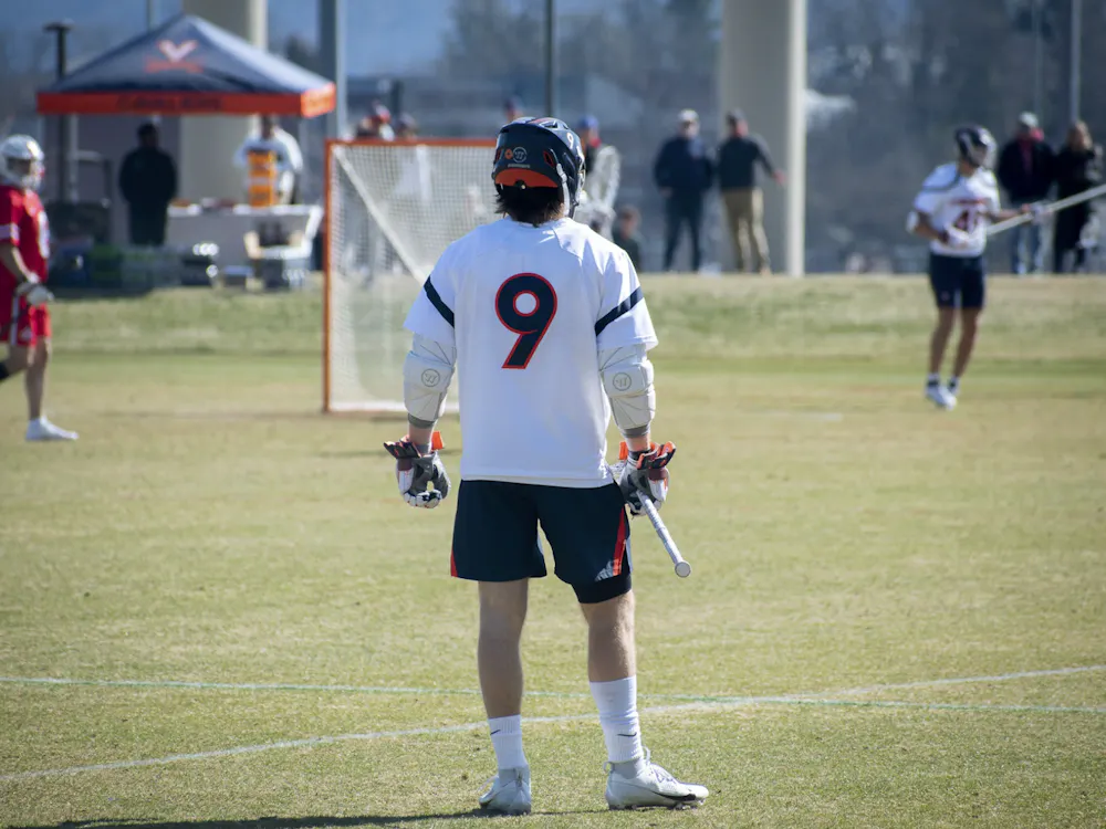 Millon looks on as the Cavalier offense strikes against Ohio State.
