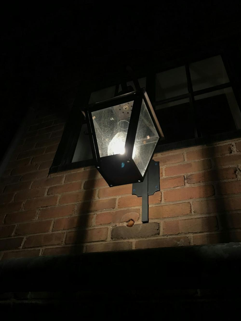 Alley Light is marked only by a single white light above its doorway, encased in a wrought-iron lantern — if the light is on, that’s the signal to head inside. 
