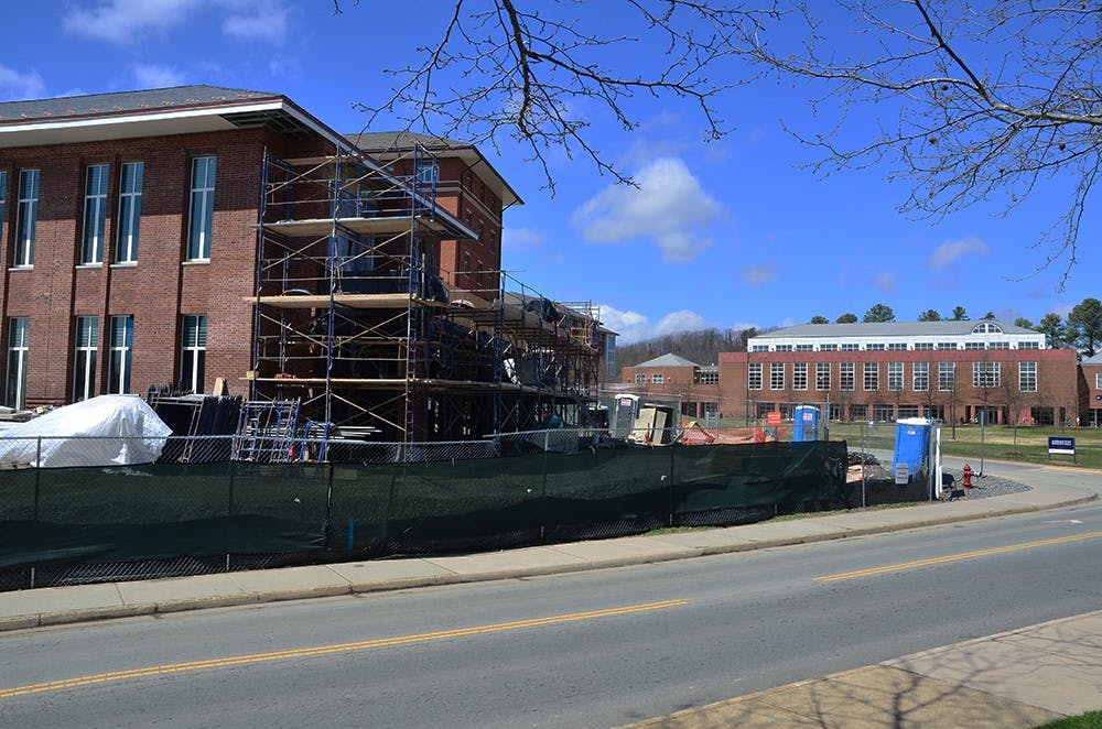 <p>The dorm building to be named Gibbons House is still under construction on Alderman Road. </p>