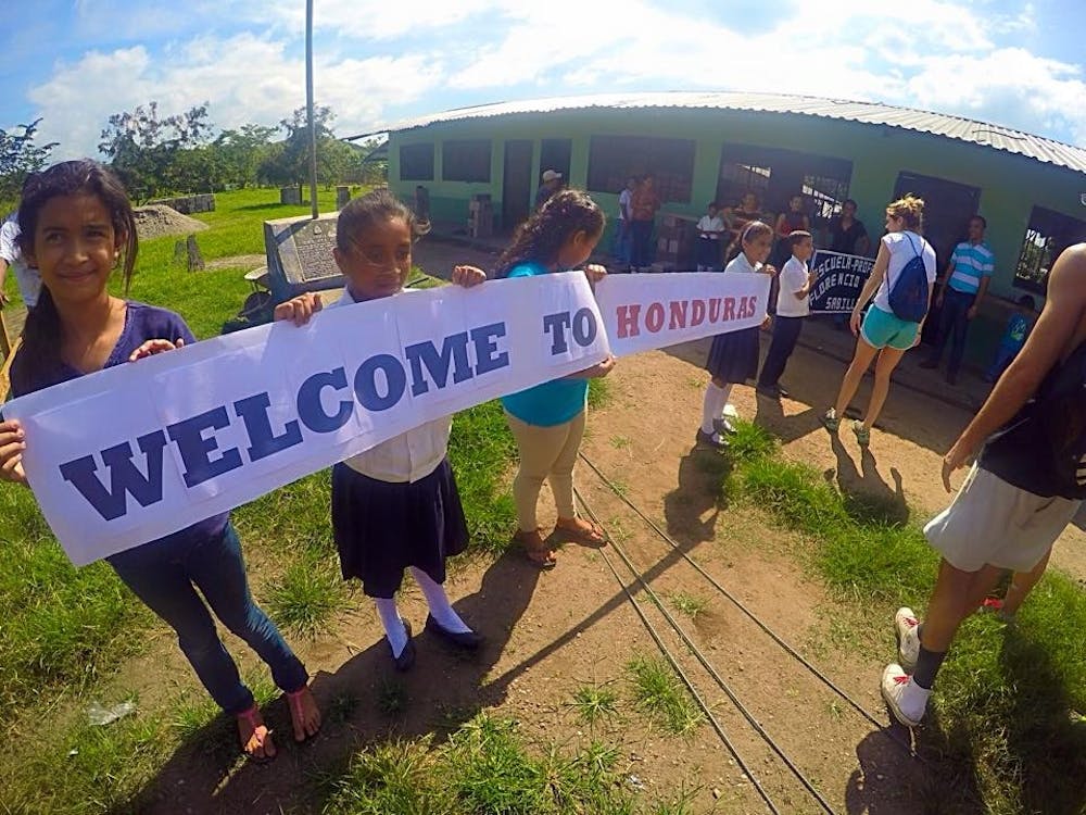 <p>Members of the University's chapter of Students Helping Honduras participate in an annual service trip to the country, during which they build schools for impoverished children.</p>