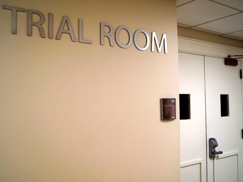 Overwhelming majorities at Sunday's meeting voted in favor of maintaining a two-semester leave of absence for students who file informed retractions and offering a random jury of peers as a trial option for accused students.