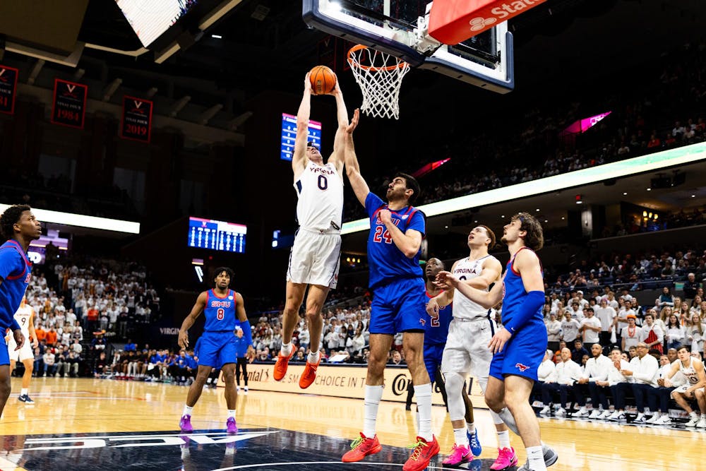 Buchanan finishes a dunk in traffic.