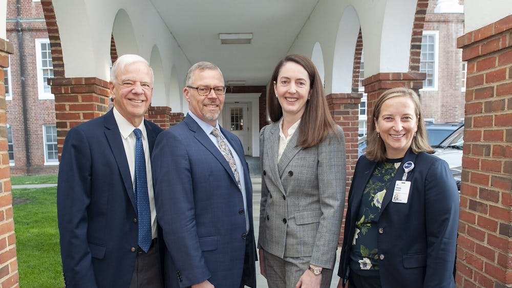 Dr. J. Scott Just (second from left) was appointed Monday as the new chief executive officer of the U.Va. Physicians Group. 