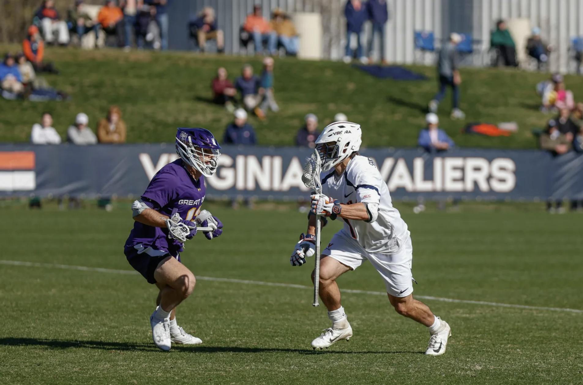 Graduate attackman Connor Shellenberger dodges against an Albany defender.