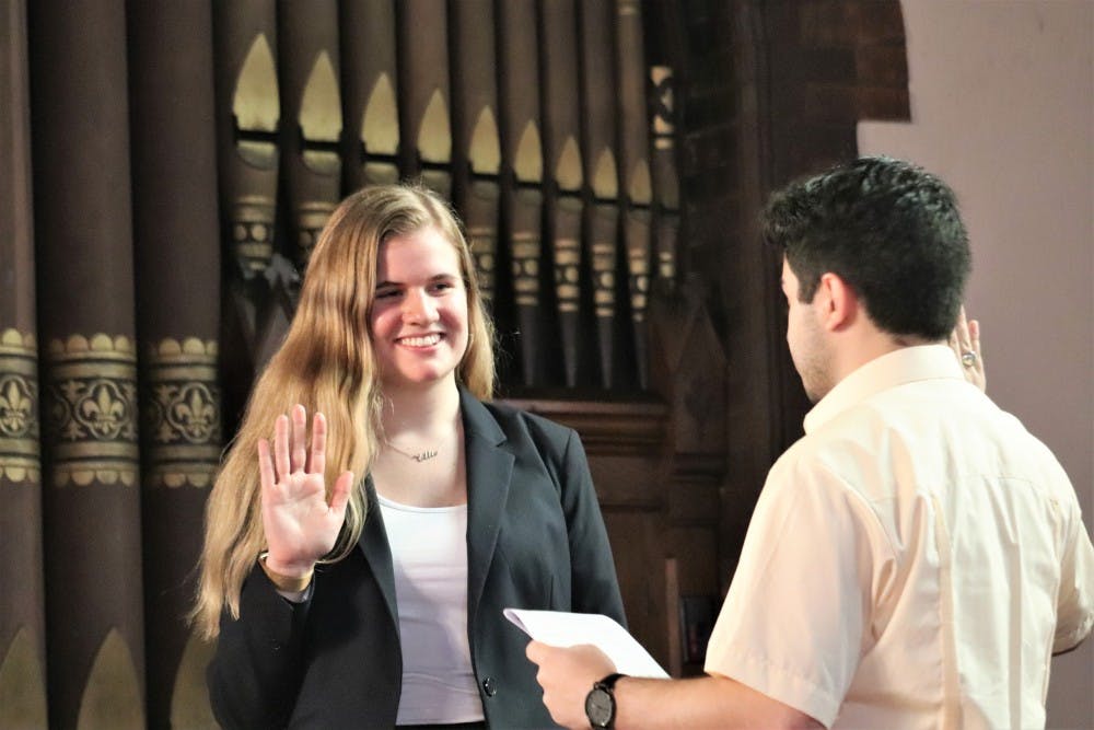 <p>Brasacchio (left) was sworn in as Student Council president Sunday by Alex Cintron, a fourth-year College student and outgoing president.&nbsp;</p>