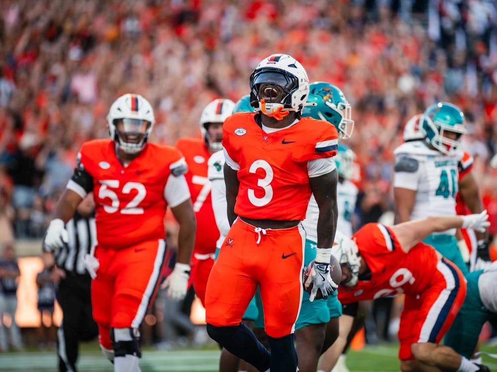 J'Mari Taylor celebrates another big play for Virginia.