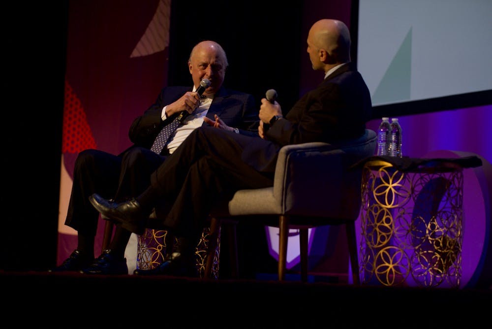 John Negroponte spoke at the TomTom Founder's Festival in April with Miller Center CEO William Antholis.