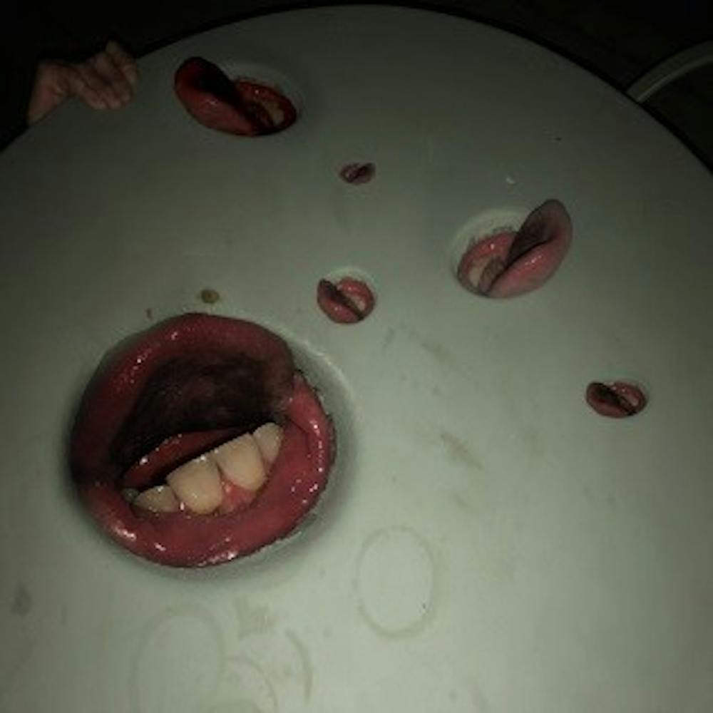 <p>Undefinable group Death Grips returns with their latest LP "Year of the Snitch," an album as complex and disturbing as its cover art suggests.</p>