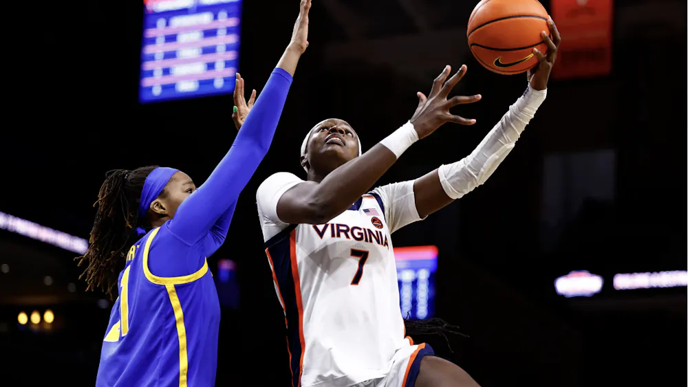 Senior forward Tabitha Amanze lays it in to contribute to an 84-46 against Pittsburgh.