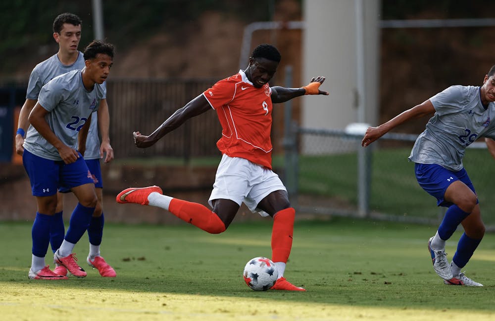 <p>Fourth-year AJ Smith hammers home a goal to put the Cavaliers up early.</p>