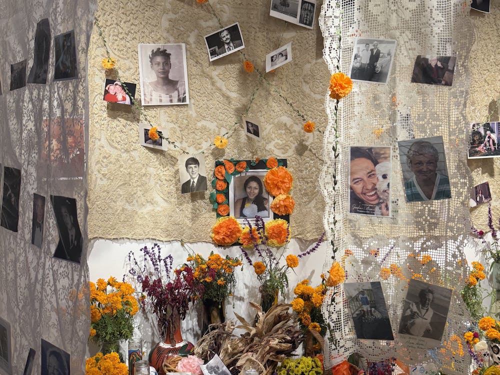 The display is made possible by the contributions of Charlottesville’s Mexican and Latine community members, who reserve spaces to honor their loved ones and spend time adorning the halls with offerings.