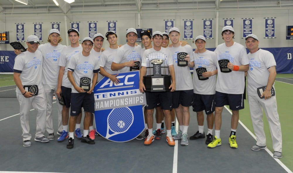 Virginia poses with the championship trophy after clinching the  2015 ACC Men's Tennis Championship in Durham, N.C., April. 26, 2015. (Photo by Sara D. Davis, theACC.com)