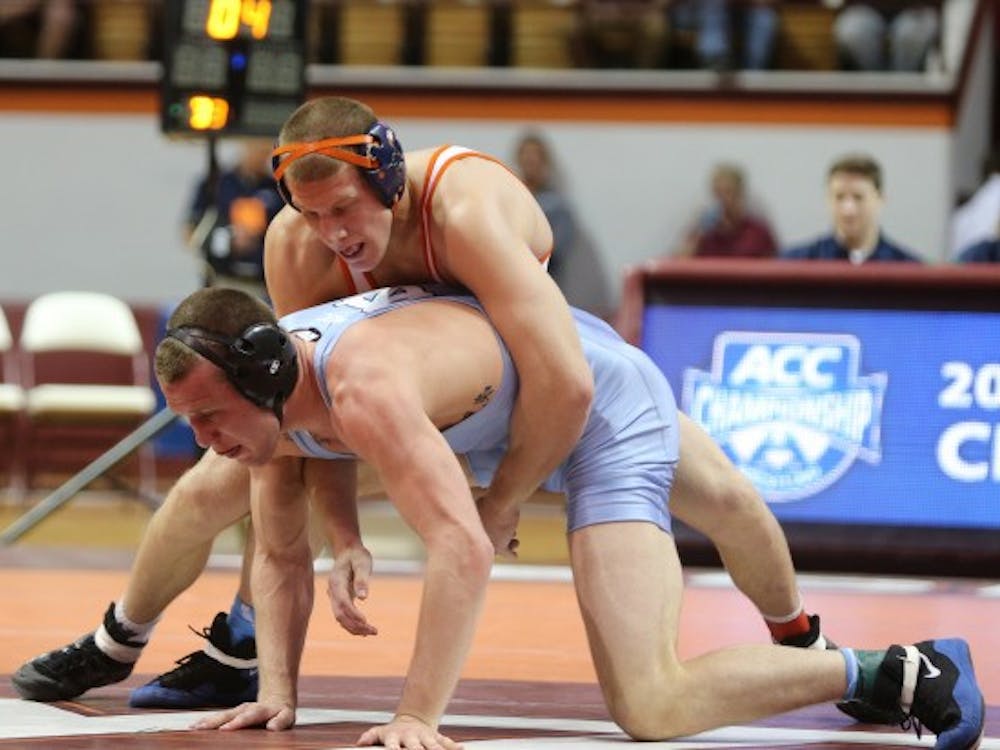 No. 2 senior Nick Sulzer was a bright spot in the loss, Virginia's first at home since Nov. 27, 2011. He overwhelmed Ohio State sophomore Justin Kresevic for a 23-8 technical fall. 