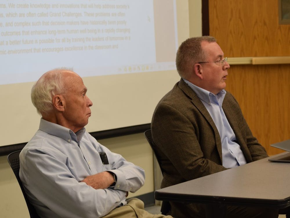 Systems Prof. and Department Chair Barry Horowitz (left) and Assoc. Systems Prof. Peter Beling (right)