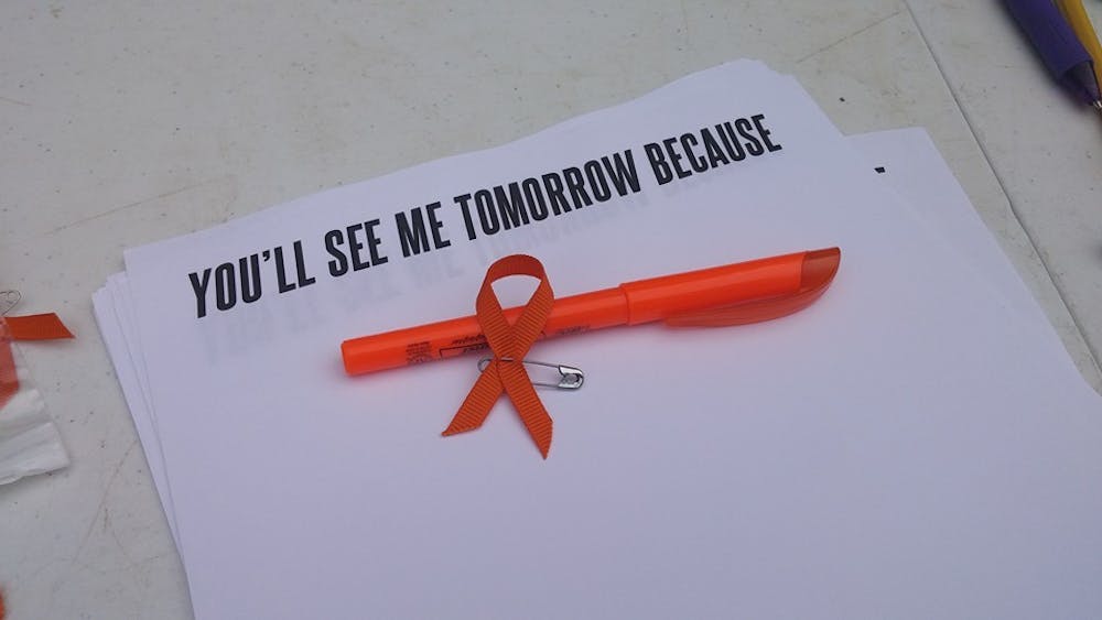 <p>This year's National Suicide Prevention Week was represented by the phrase "We'll see you tomorrow," the colors orange and yellow and orange ribbons meant to let struggling students know that they're not alone.</p>