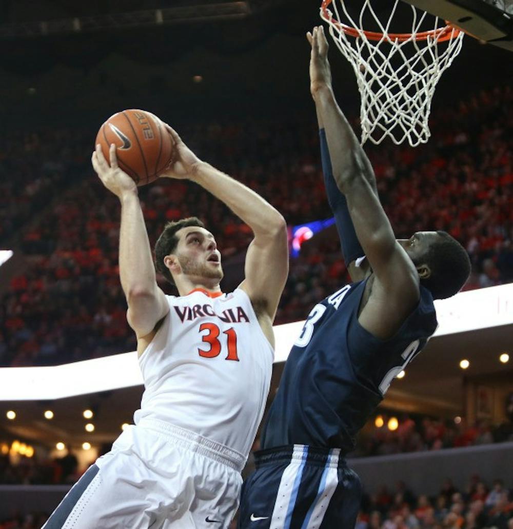 <p>Freshman forward Jarred Reuter scored seven of Virginia's first 14 points and set career bests with 11 points and 16 minutes</p>