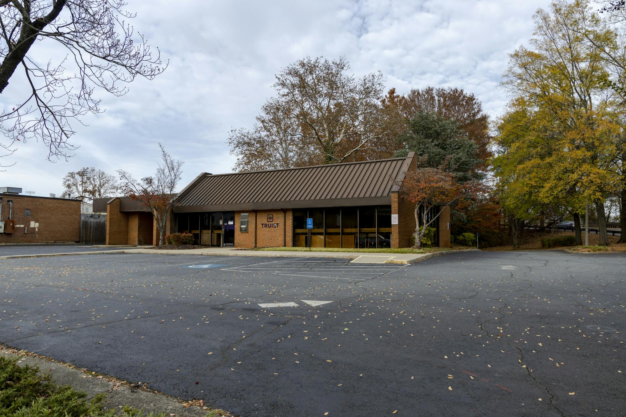 Accepting the zoning proposal would allow for the construction of an apartment complex where Truist Bank used to be, and the developers of this property are gearing this housing towards University students, faculty and young professionals.