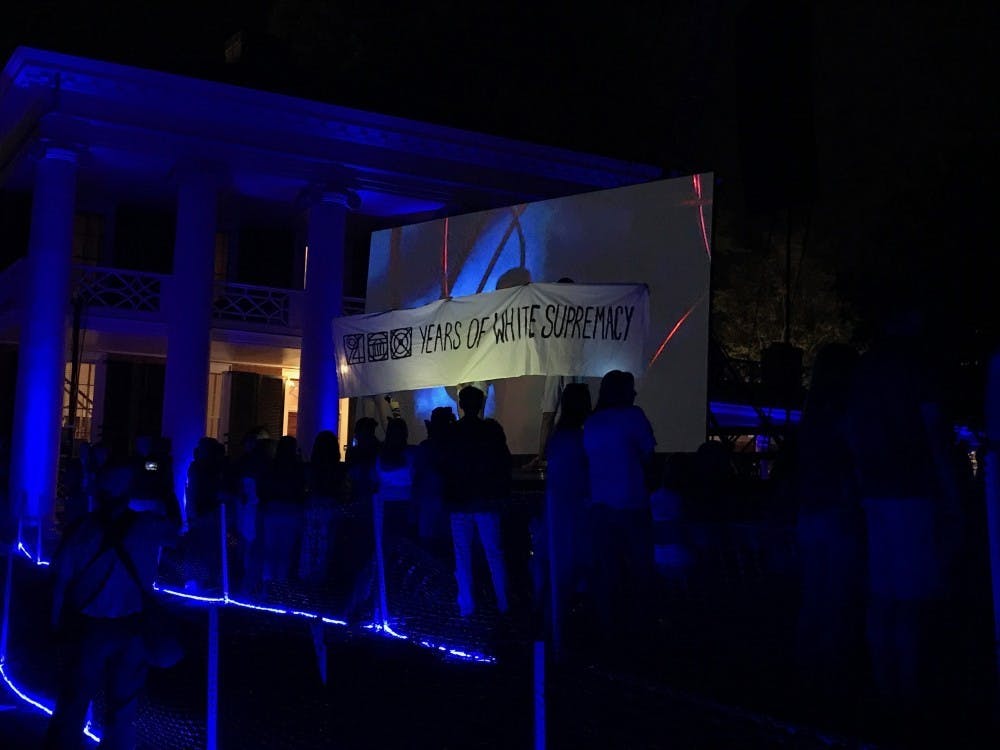 All three were processed in the Albemarle-Charlottesville Regional Jail, and charged with trespassing, a Class 1 misdemeanor. They were released later that night.