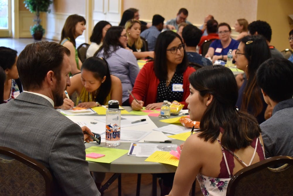 <p>University students, faculty and administrators gather in Alumni Hall to discuss the future of establishing an ethnic studies program at the University.&nbsp;</p>