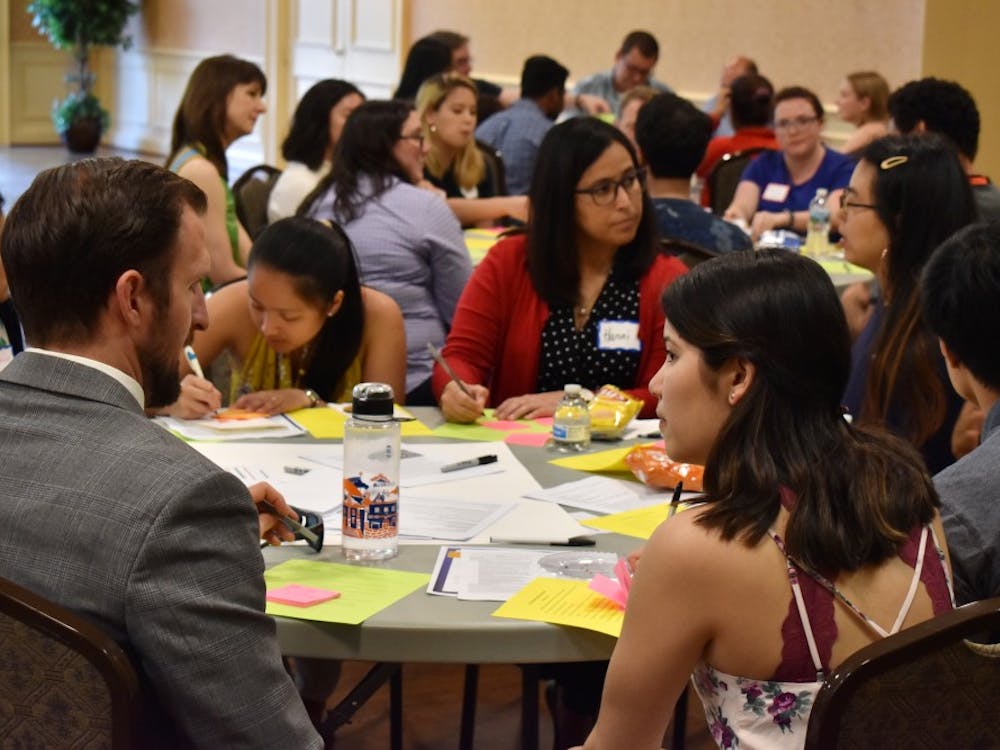 University students, faculty and administrators gather in Alumni Hall to discuss the future of establishing an ethnic studies program at the University. 