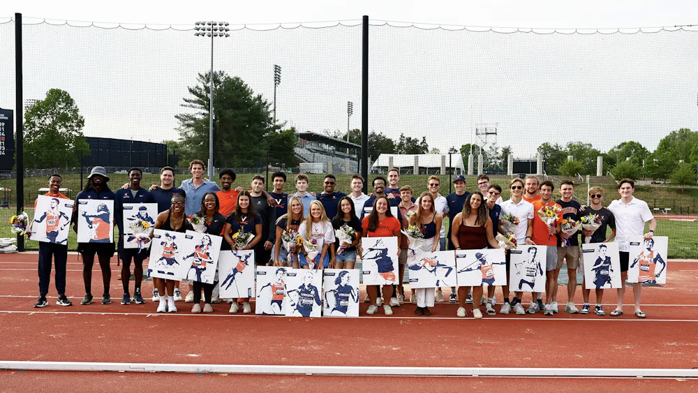 All of the seniors and graduates on the team were recognized in a post-meet ceremony.