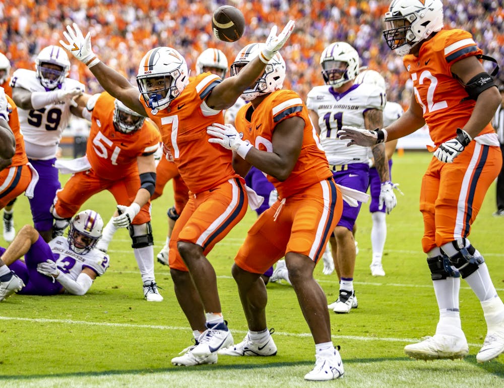 Mike Hollins celebrates a touchdown against James Madison Sept. 9, 2023.