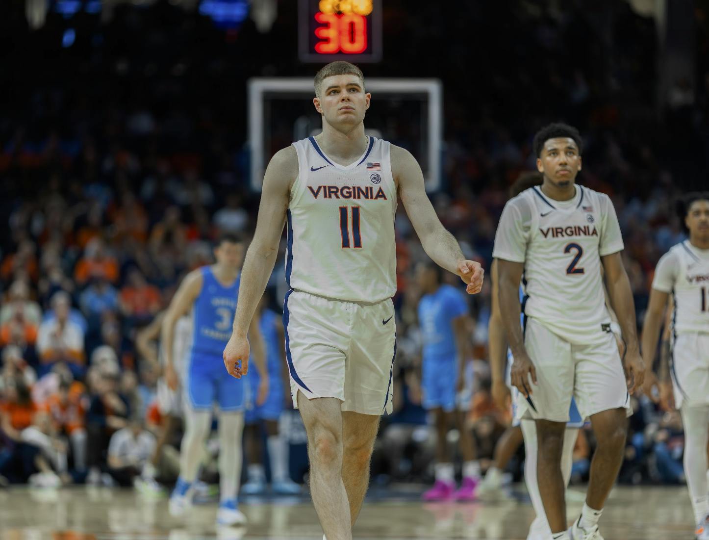 The Cavaliers exit from a timeout, trailing against North Carolina.