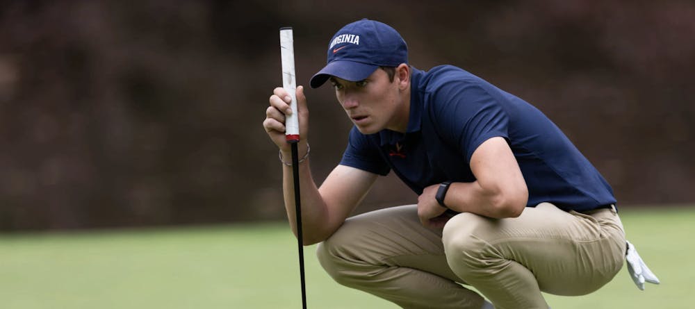 <p>Ben James sizes up a putt at the Valero Texas Collegiate.</p>