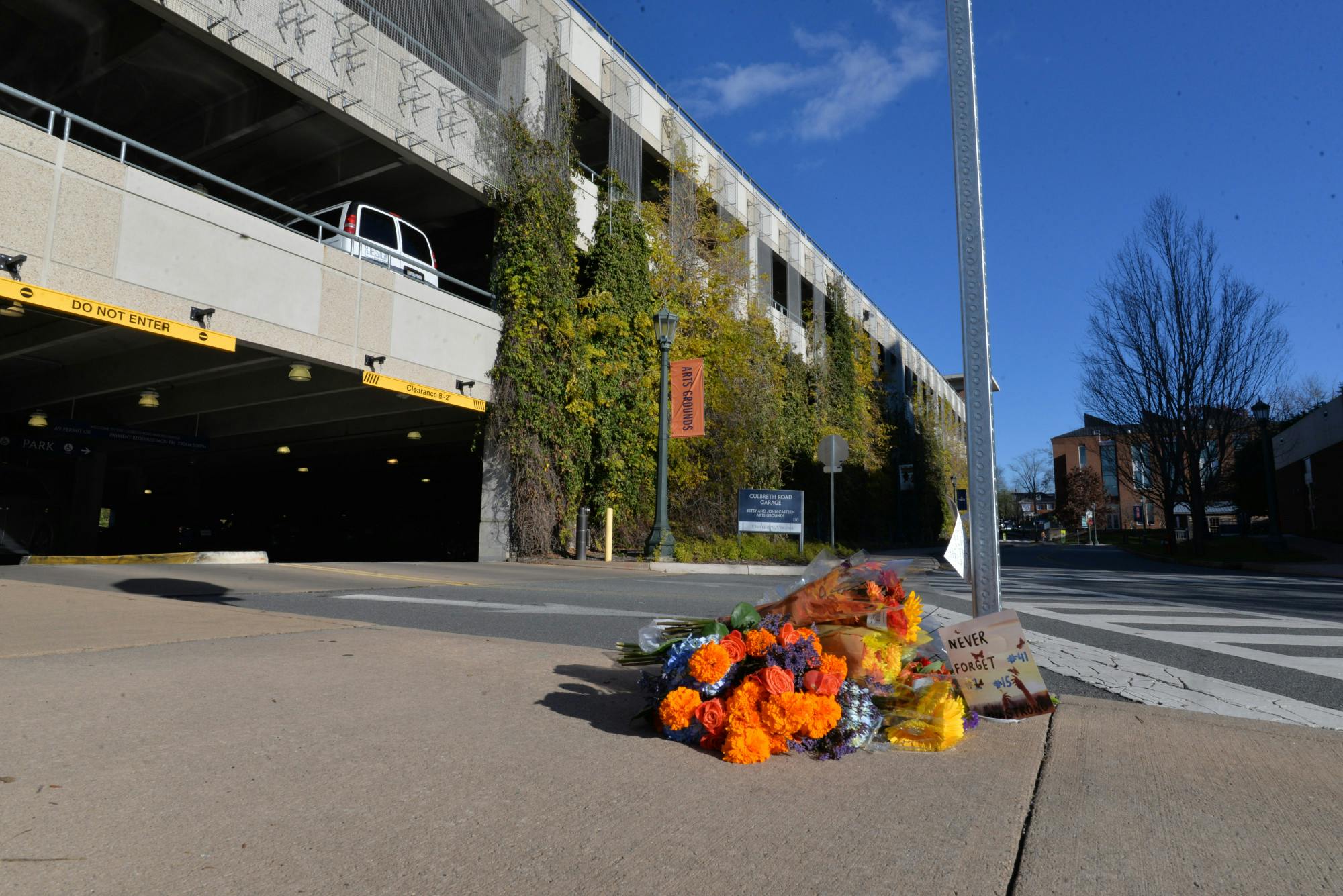 The event at Betsy and John Casteen Arts Grounds places the memorial close to Culbreth Garage — the site of the Nov. 13 shooting. 
