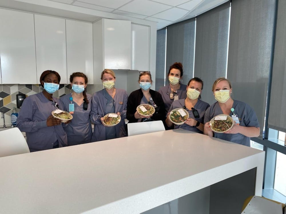 On Feb. 17, the four coordinated with friends and families to pool $1284.41 together and deliver 112 individually-wrapped Roots bowls, enough for every healthcare worker at the University Hospital’s three COVID-19 units on that day’s morning and night shifts.