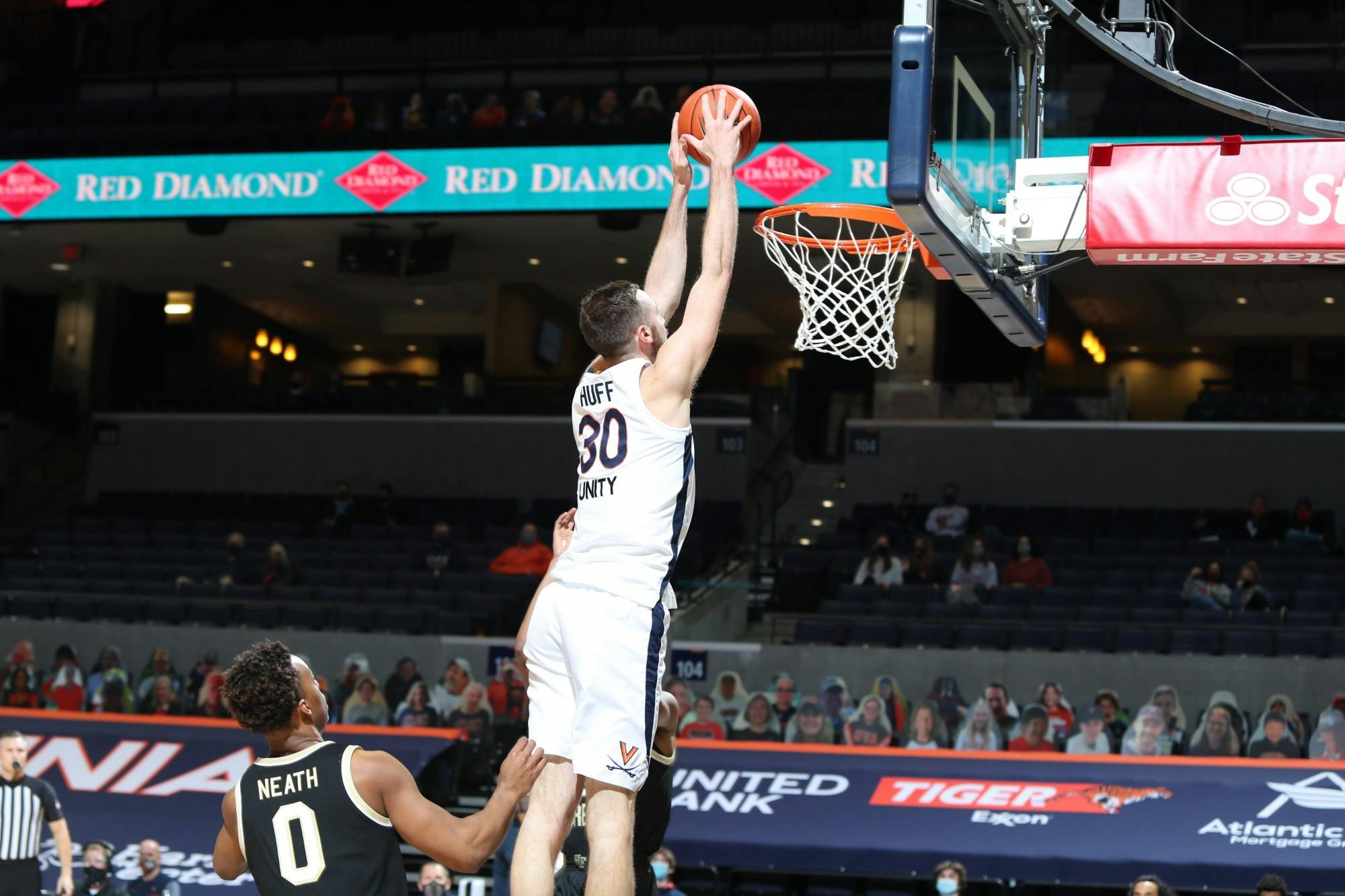 Senior forward Jay Huff was one of five Cavaliers to post double-digit point tallies, scoring 11 Wednesday night.&nbsp;