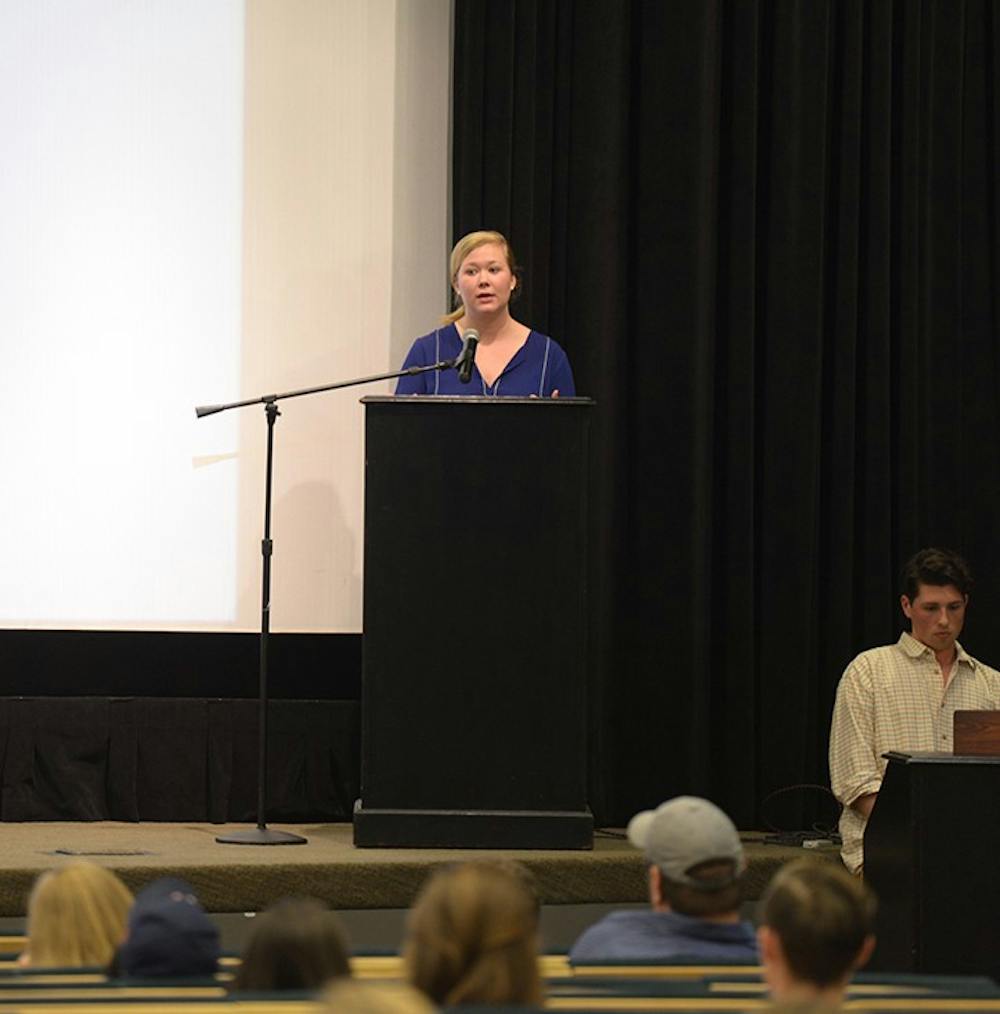 <p>Elizabeth Parker, co-chair of Student Council's Legislative Affairs Committee, speaks at the Student Senate</p>