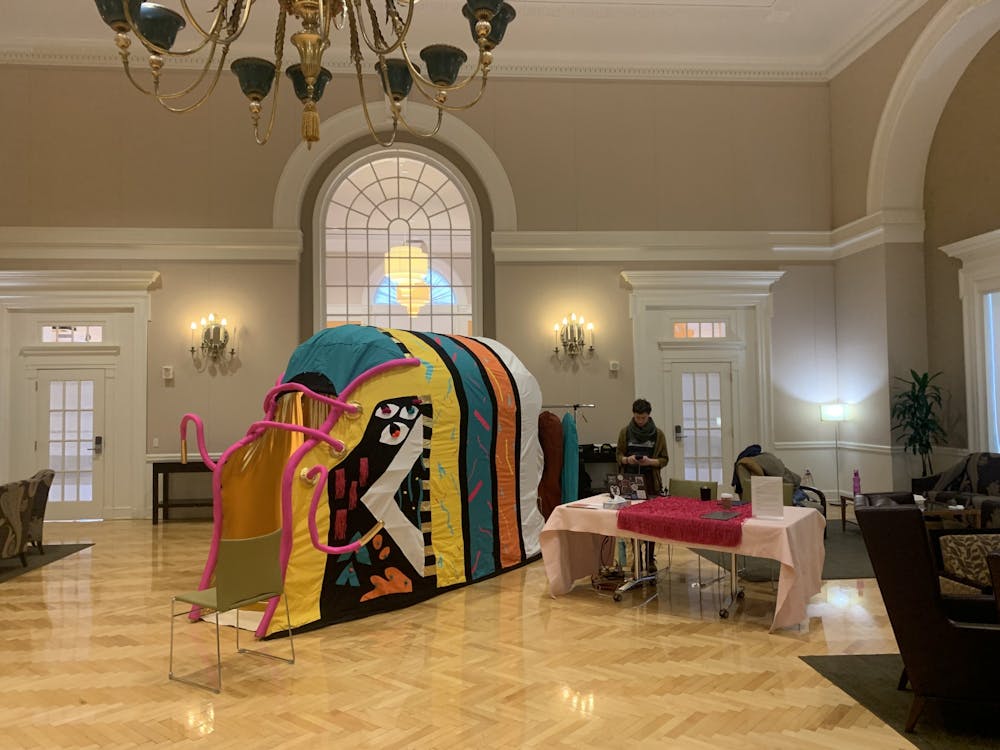 Presented as a giant colorful shoe, the experience allowed participants to step into the life of an unidentified second year University student who identifies as black, female, and queer.