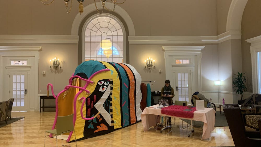 Presented as a giant colorful shoe, the experience allowed participants to step into the life of an unidentified second year University student who identifies as black, female, and queer.