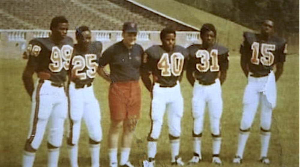 <p>Stanley Land, Kent Merritt, John Rainey, Gary Ham and Harrison Davis pose at practice.</p>