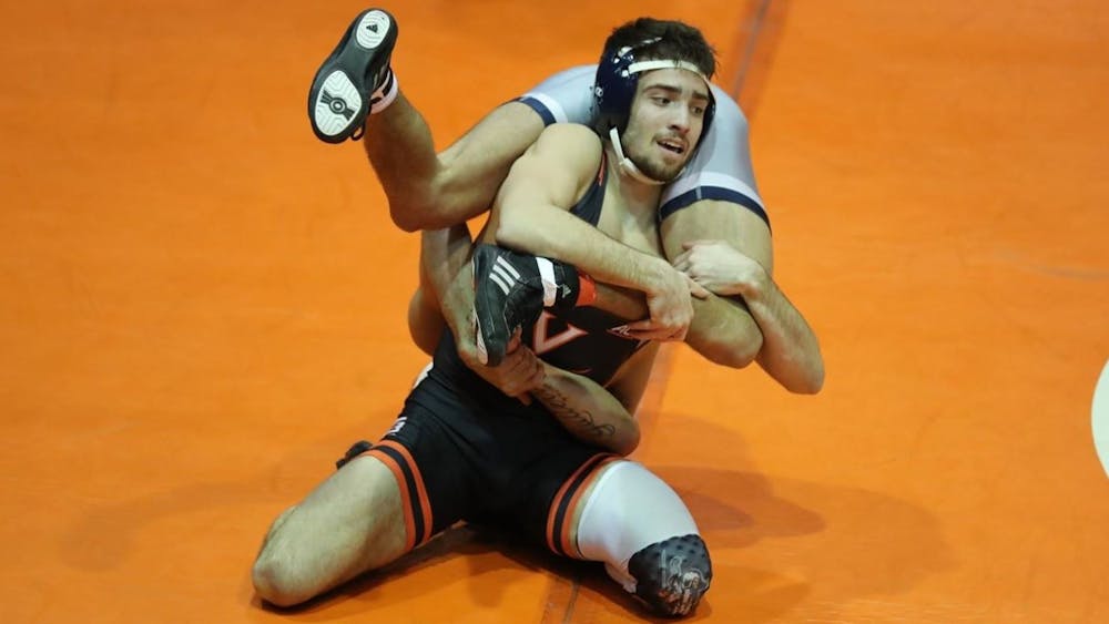 Virginia dominated Duke Friday night, winning its first five bouts with ease.