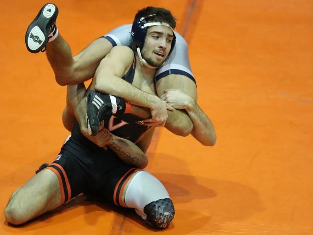 Virginia dominated Duke Friday night, winning its first five bouts with ease.