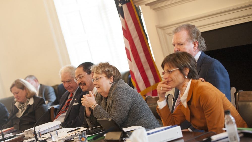 Rector George Martin (above, fourth from the right) has outlined a more tightly controlled Board message through a stricter ethics policy. Former Rector Helen Dragas (above, far right) has resisted these changes, saying they would promote “an atmosphere of secrecy.”