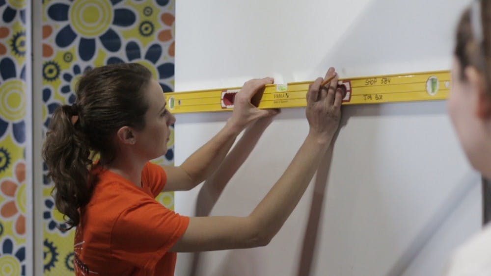 Carpenter Anne Lassere during a demonstration at the Queens of DIY Toolbox Workshop on Feb. 24.
