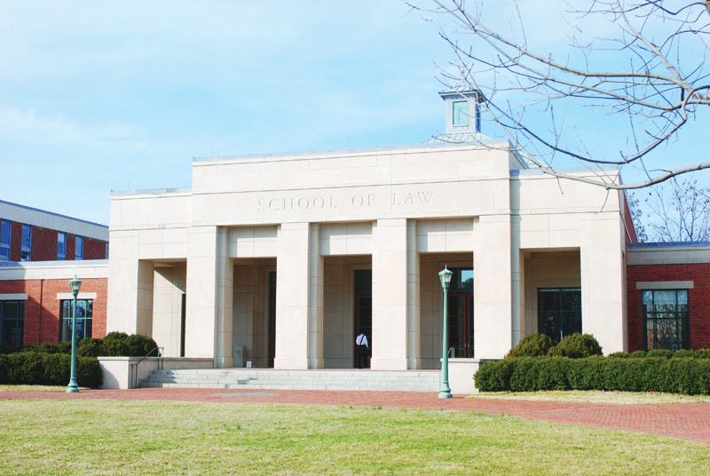 	The Innocence Project at the Law School, above, helped throw out Maligie Conteh’s wrongful robbery conviction.