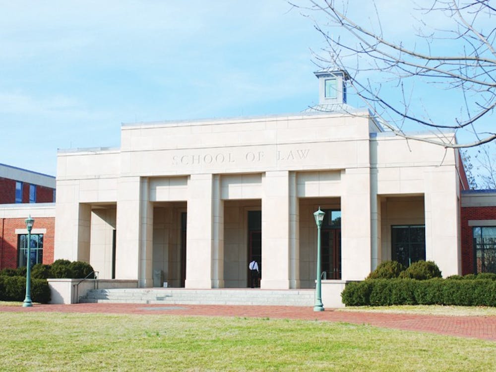 The Innocence Project at the Law School, above, helped throw out Maligie Conteh’s wrongful robbery conviction.