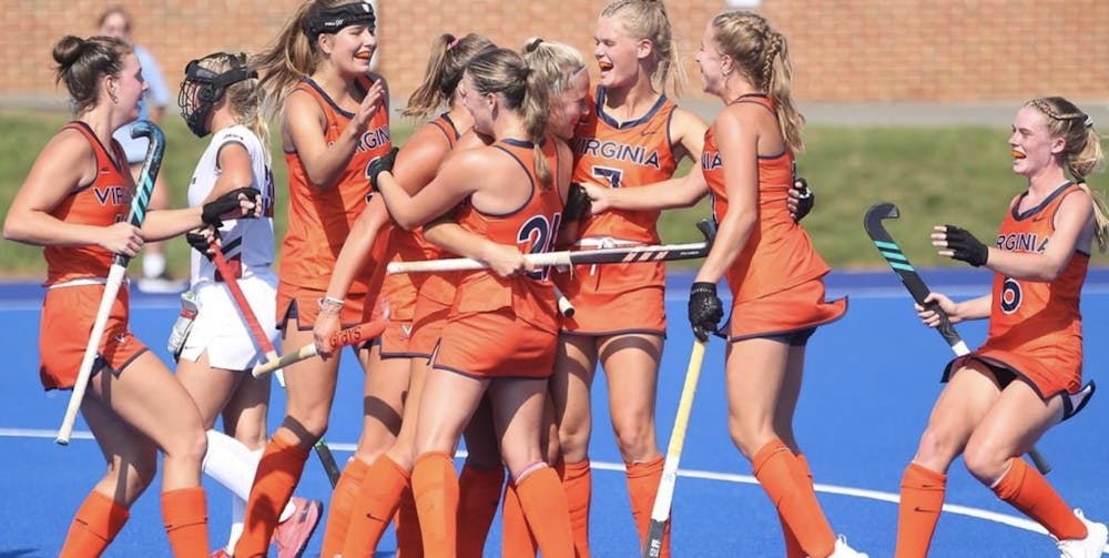 <p>The Cavaliers celebrate the game-winning goal.</p>