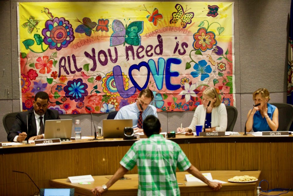 A speaker at the hearing voices his concerns about Tim Heaphy's review. 

